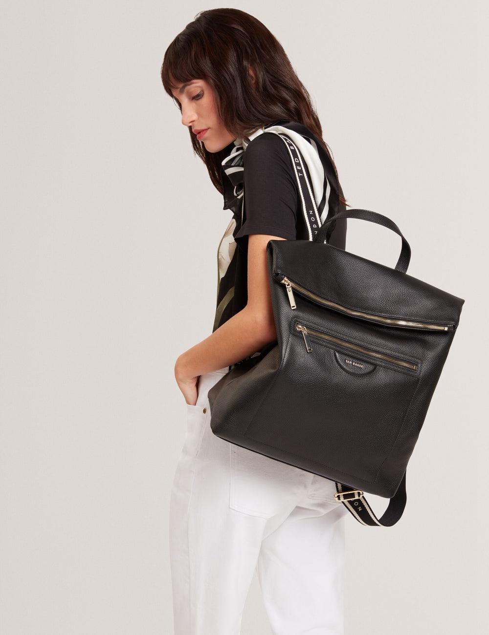 Women Ted Baker ESSAYA - Leather Webbing Strap Fold Over Backpacks Black | India  ALTI-37215