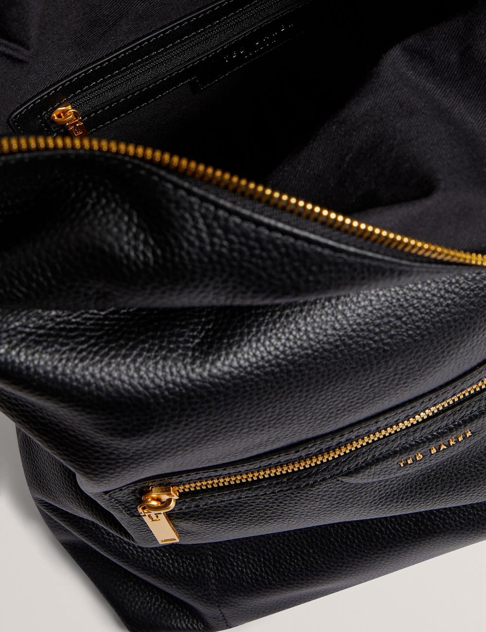 Women Ted Baker ESSAYA - Leather Webbing Strap Fold Over Backpacks Black | India  ALTI-37215